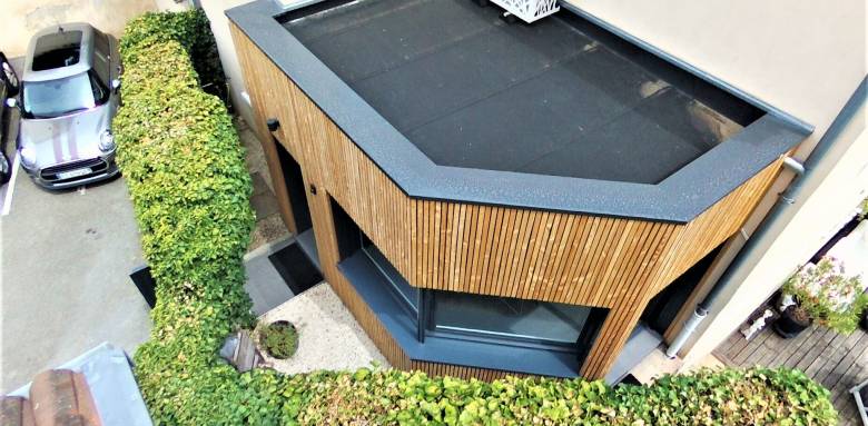 Construction d'une extension bois à toit plat - Nantes 44