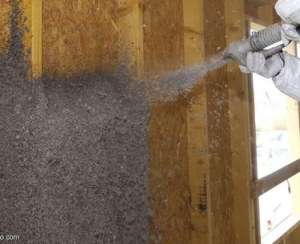 Isolation intérieure d'une ossature bois, par projection de l'isolant