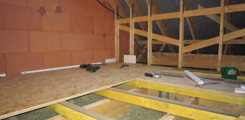 Isolation combles en fermettes industrielles