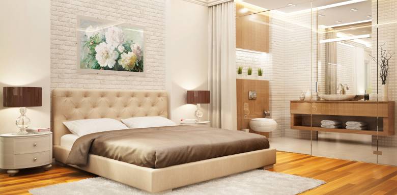 Une verrière pour séparer la salle de bains et la chambre.