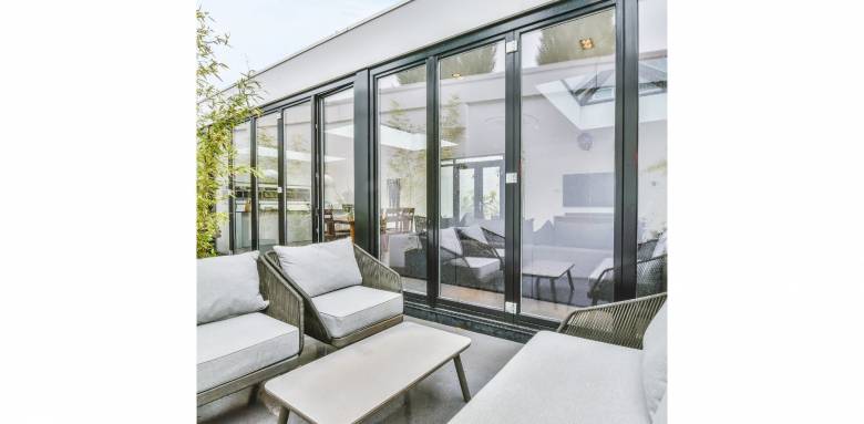 Aménager une véranda : transformez votre maison en espace lumineux et accueillant - Port-en-Bessin-Huppain 14520