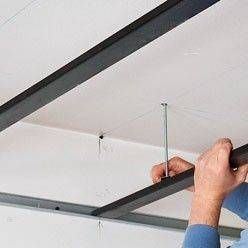Travaux de pose de faux-plafond suspendu dans le salon - Bouc-Bel-Air 13
