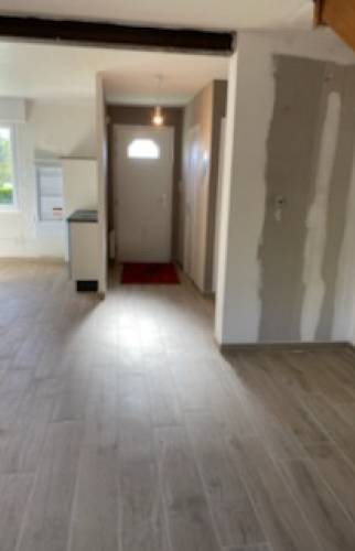 Condamnation d’une porte d’accès pour réagencement intérieur – Maison rénovée à Guichen