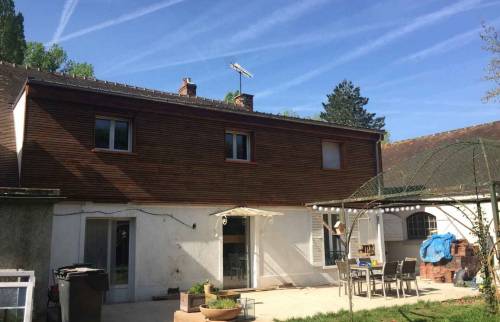 Surélévation en ossature bois - bardage faux Claire voix marron