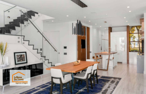 Transformation d’une pièce de vie moderne et lumineuse à Roquefort avec ouverture des espaces, cuisine contemporaine et rénovation intérieure complète.