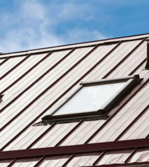 Toiture zinc avec fenêtres de toit