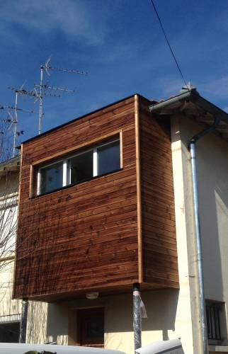 Extension en bois isolée et traitée par l'extérieur