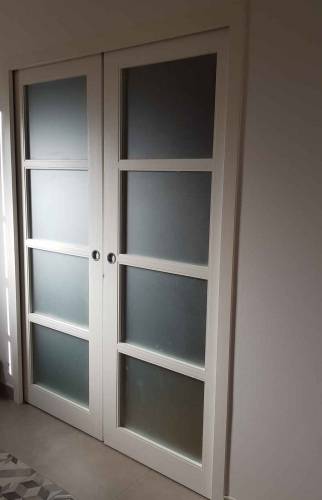 Porte à galandage vitrée à Saintes