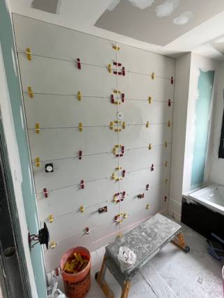  Création de salle de bain avec pose de faïence murale en cours - Nantes 44000
