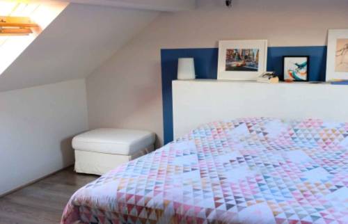 Aménagement dans les combles d'une chambre parentale spacieuse (91°