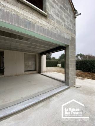 Extension de maison grande baie vitrée