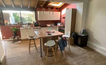 Rénovation à Voiron : ouverture entre cuisine et salon pour une grande pièce de vie