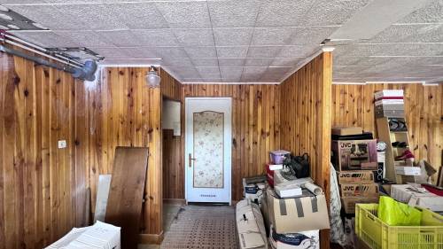 Ancien garage à convertir en chambre