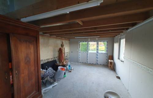 Rénovation de façade terminée en cours...