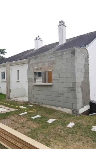 Agrandissement latéral de la pièce à vivre