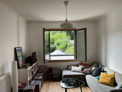 Salon avant rénovation et ouverture du mur porteur pour la pose de baie vitrée coulissante - Nantes 44