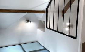 espace bureau avec verrière et plancher verre et acier 