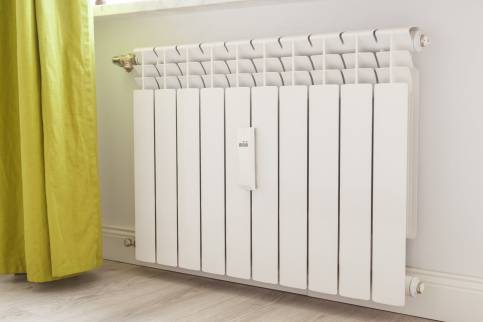 radiateur neuf - La Maison Des Travaux