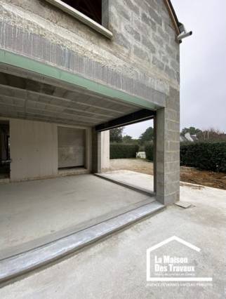 Extension de maison grande baie vitrée