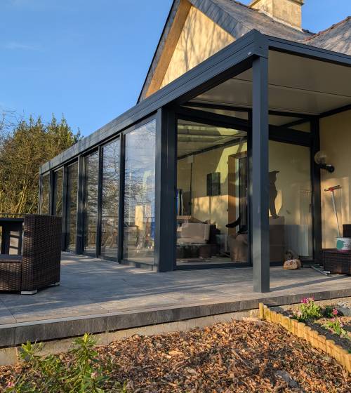 Aperçu de la véranda et de la pergola - Extension et aménagement extérieur