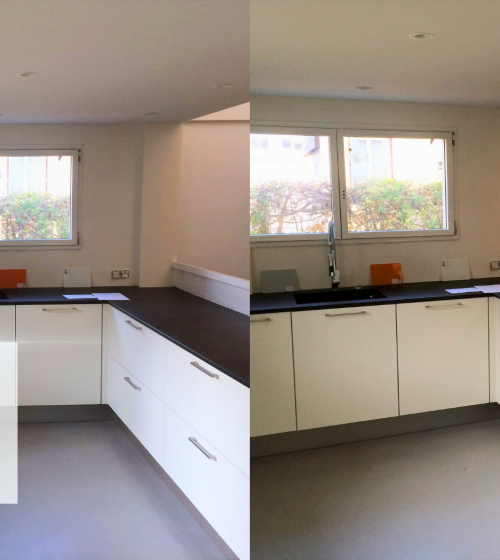 Cette cuisine en U combine élégance et fonctionnalité. Avec ses façades blanches et son plan de travail noir, elle optimise l’espace tout en offrant une circulation fluide. 