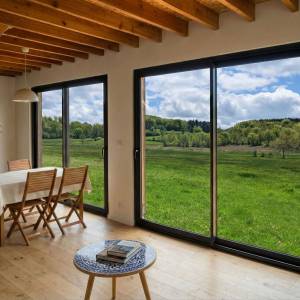 Grandes ouvertures sur l'extérieur - maison bioclimatique - Guillaume Charpentier