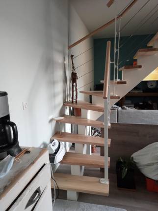 Installation d'un escalier quart tournant