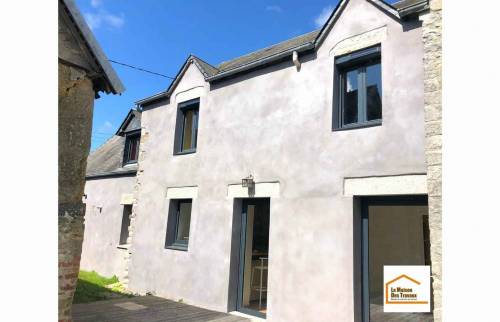 Rénovation d'une façade à Ouville (50210).