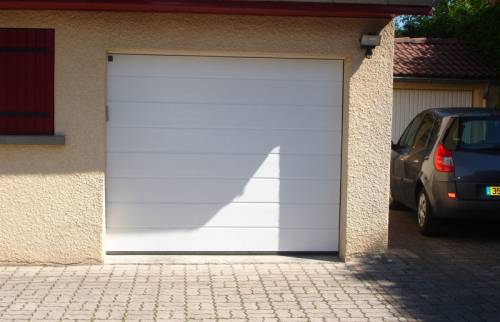 Remplacement d'une porte de garage à Vinay