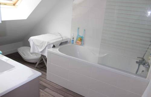Création salle de bains dans les combles maison Courbevoie (92400)