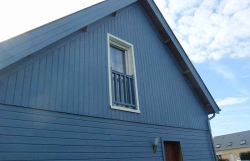Réalisation d'une agrandissement de maison en bleu à Caen