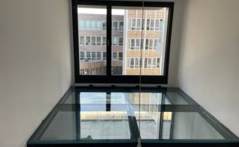 Création mezzanine bois et plancher vitré à Clichy 