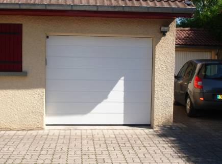 Pose d'une nouvelle porte de garage Poissy