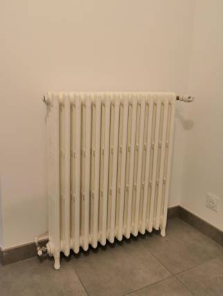 Radiateurs fonte préexistants rénovés