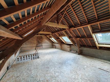 Optimisation et agrandissement de la surface habitable grâce à l'aménagement des combles