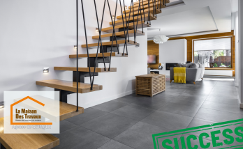 Un escalier moderne suspendu en bois et métal illumine un espace de vie contemporain, combinant design épuré et fonctionnalité. 🌟