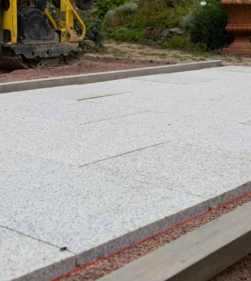 Création d'une terrasse en dalles gravillonnées à St Pair Sur Mer (50380)