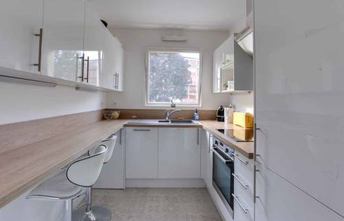 Rénovation d’un appartement complet à Sceaux 92 le séjour la cuisine