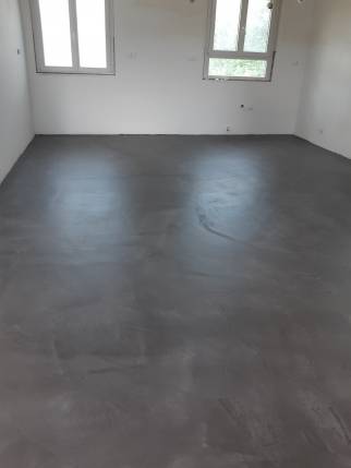 Travaux de rénovation de maison avec pose de béton ciré - Saint-Jean-de-Niost 01800