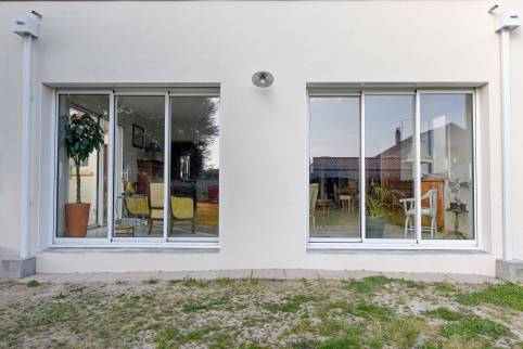 Construction d'un agrandissement de maison avec grandes baies vitrées - Saint-Etienne-de-Tulmont 82
