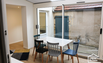 Véranda aménagée en salon