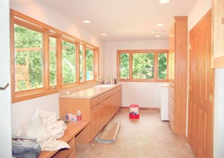 Construction d'une extension en bois avec aménagement de cuisine sur mesure - Sainte-Pazanne 44680