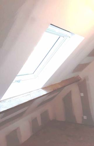 Installation d'une fenêtre de toit