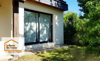 Rénovation à Brax : remplacement de menuiseries anciennes par une baie vitrée moderne en PVC double vitrage.