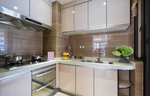 Rénovation de cuisine en appartement avec façades inox sur Osny (95)