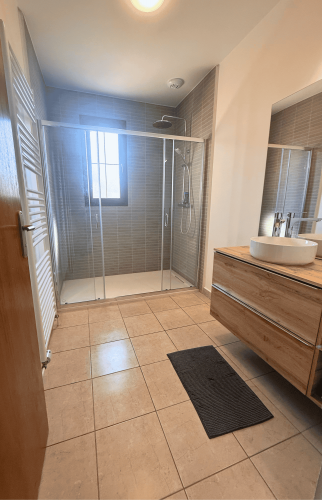 Rénovation complète d’une salle de bain à La Montagne après