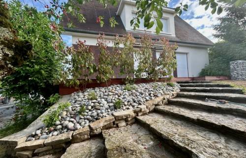 Rénovation extérieure à Sainte-Savine : une terrasse bois et un nouvel aménagement paysager 1