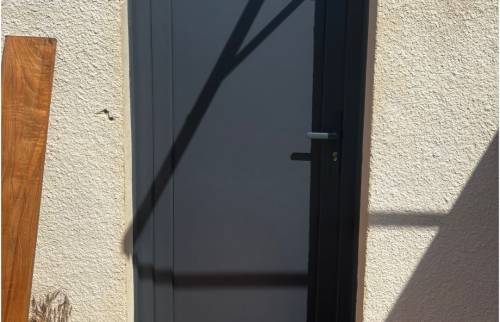 porte de service pleine pvc