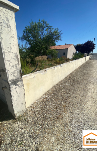 muret de clôture avant travaux