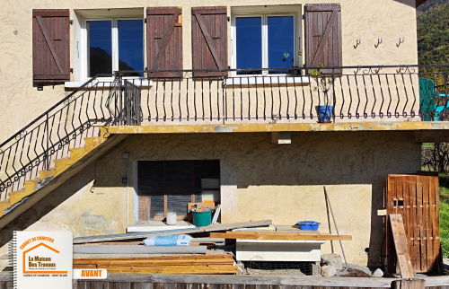aménagement garage Grand-Bornand, percement mur porteur, pose baie vitrée coulissante, rénovation garage Haute-Savoie, lumière naturelle pièce, La Maison des Travaux